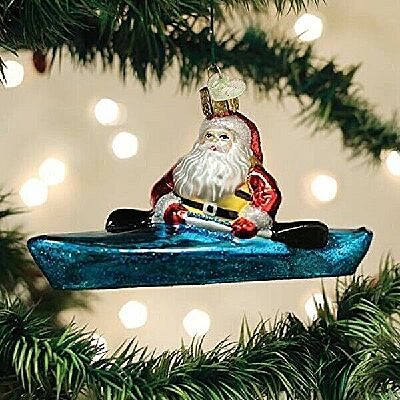 Glass Blown Old World Christmas Santa in Kayak Ornament